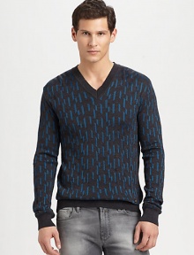 An artfully designed jacquard pattern adorns this v-neck pullover, shaped in a luxurious extra fine merino wool blend.V-neckRibbed knit collar, cuffs and hem61% merino wool/39% viscoseDry cleanMade in Italy