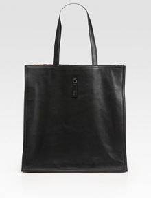 Crafted from sleek Taurillon leather, this slim carryall features a leopard-print lining for an exotic touch.Double top handles, 8½ dropOne inside zip pocketTwo inside open pocketsLeopard-print lining14W X 14H X 8DMade in Italy Crafted from sleek Taurillon leather, this slim carryall features a leopard-print lining for an exotic touch.Double top handles, 8½ dropOne inside zip pocketTwo inside open pocketsLeopard-print lining14W X 14H X 8DMade in Italy