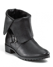 Trend right and cool with a rugged heel, these Dolce Vita ankle boots will weather the season in style. Trend right and cool with a rugged heel, these Dolce Vita ankle boots will weather the season in style.