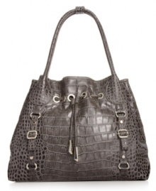 Every urban-jungle ensemble deserves exotic appeal, like this croc-embossed tote from Jessica Simpson. The spacious design is outfitted with gleaming hardware and buckle accents, while the interior flaunts multiple pockets for effortless on-the-go style. Every urban-jungle ensemble deserves exotic appeal, like this croc-embossed tote from Jessica Simpson. The spacious design is outfitted with gleaming hardware and buckle accents, while the interior flaunts multiple pockets for effortless on-the-go style.
