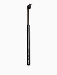 Burberry Eye Brush No.11 is a wide contour brush made from ultrasoft goat hair. It is used for the outer corners of the lid to add depth and enhance the eyes. Used by Burberry Beauty makeup artists to create a contoured eye shape. Burberry Eye Brush No.11 is a wide contour brush made from ultrasoft goat hair. It is used for the outer corners of the lid to add depth and enhance the eyes. Used by Burberry Beauty makeup artists to create a contoured eye shape.