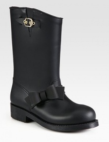 Side bow and buckle adornment add feminine charm to this short rainboot. Rubber heel, 1 (25mm)Shaft, 10½Leg circumference, 13½Rubber upperLeather liningRubber solePadded insoleMade in Italy