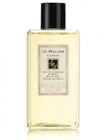 Inspired by a sun drenched morning in an English garden, White Jasmine & Mint captures the scent of jasmine, wild rose and white blossoms with an unexpected twist of wild mint. White Jasmine & Mint Bath Oil gently fragrances and moisturises the skin. Lush and softly foaming, it's pure relaxation. 8.5 oz. Inspired by a sun drenched morning in an English garden, White Jasmine & Mint captures the scent of jasmine, wild rose and white blossoms with an unexpected twist of wild mint. White Jasmine & Mint Bath Oil gently fragrances and moisturises the skin. Lush and softly foaming, it's pure relaxation. 8.5 oz.