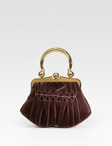 Slim design crafted from pleated velvet with goldtone hardware. Top handle, 5¾ dropClasp closureTwo inside open pocketsSatin lining8W X 7½H X 2¾DMade in Italy Slim design crafted from pleated velvet with goldtone hardware. Top handle, 5¾ dropClasp closureTwo inside open pocketsSatin lining8W X 7½H X 2¾DMade in Italy
