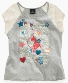 Lace up! The dainty accents on this graphic tee from Baby Phat make it floaty and fashionable and a style for summer into fall. Lace up! The dainty accents on this graphic tee from Baby Phat make it floaty and fashionable and a style for summer into fall.