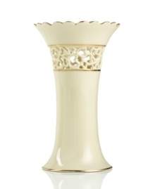 Distinguished by a scalloped edge, bands of gold and heart cutouts in creamy ivory porcelain, the lovely vase combines traditional style and timeless grace. Qualifies for Rebate Distinguished by a scalloped edge, bands of gold and heart cutouts in creamy ivory porcelain, the lovely vase combines traditional style and timeless grace. Qualifies for Rebate