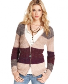 Colorblocked stripes lend a graphic look to this Free People sweater for a stylish everyday cover up!