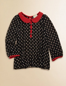 A little birdie told her about this adorable, lightweight, owl-printed blouse with contrasting trim and Peter Pan collar.Peter Pan collarLong sleeves with contrasting cuffsButton-front and backPolyesterDry cleanMade in the USA of imported fabric A little birdie told her about this adorable, lightweight, owl-printed blouse with contrasting trim and Peter Pan collar.Peter Pan collarLong sleeves with contrasting cuffsButton-front and backPolyesterDry cleanMade in the USA of imported fabric