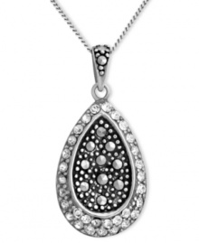 Genevieve & Grace knows glam. This shimmering teardrop pendant combines round-cut crystals and marcasite in a sterling silver setting. Approximate length: 18 inches. Approximate drop: 1 inch. Genevieve & Grace knows glam. This shimmering teardrop pendant combines round-cut crystals and marcasite in a sterling silver setting. Approximate length: 18 inches. Approximate drop: 1 inch.