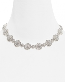 Love: the Nadri Love Knot All Around Necklace encircles you in elegance, with a beautiful, pavé floral motif.