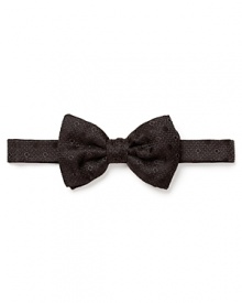 Add verve to your formal attire with a spruced-up bow tie from Salvatore Ferragamo, rendered in soft Italian silk for the look and feel of luxury. Add verve to your formal attire with a spruced-up bow tie from Salvatore Ferragamo, rendered in soft Italian silk for the look and feel of luxury.