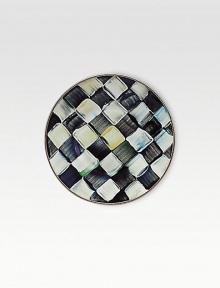 A charming enamelware design pairs perfectly with a cup of coffee or tea, handpainted checkerboard juxtaposition of ivory and onyx with bronzed stainless steel trim. Enameled steel 6 diam. Dishwasher safe Made in USA 