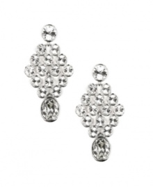 Add sparkle to your next night on the town with Givenchy's glittering crystal chandelier earrings. Crafted in silver tone mixed metal. Approximate drop: 2-1/8 inches.