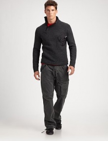 Edgy and modern in luxe lambswool, an essential mockneck sweater gets a sporty update with an asymmetrical half-zip placket and an angled taffeta pocket at the chest.Mockneck collarRibbed collar, cuffs and hemLambswoolDry cleanImported