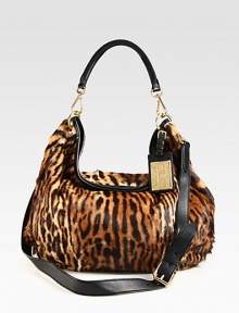 Luxurious animal print haircalf accented with supple leather in a chic slouchy design.Leather top handle, 9½ dropDetachable adjustable leather shoulder strap, 21½-22½ dropMagnetic top closureOne inside zip pocketTwo inside open pocketsSatin lining20W X 17H X 5DMade in Italy