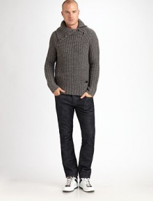 Winter warmth meets contemporary cool in this chunky-knit sweater crafted from pure wool with button detail at the collar. Ribbed trim Wool Dry clean Imported 