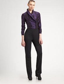 An elegant design, with a concealed button-down front and a unique overlapping wing collar.Wing collar Button-down front and button cuffs Silk Dry clean Imported of Italian fabric An elegant design, with a concealed button-down front and a unique overlapping wing collar.Wing collar Button-down front and button cuffs Silk Dry clean Imported of Italian fabric