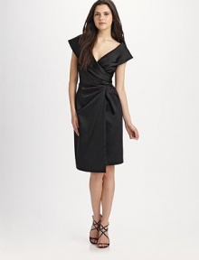 The classic little black dress is elevated in stretch satin with a fresh tulip skirt.Pleated crossover bodice Draped asymmetrical skirt Invisible back zip closure Darts at back waist About 25½ from natural waist 65% acetate/32% nylon/3% spandex 100% polyester lining Dry clean Imported