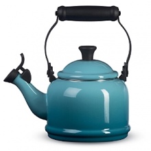 Elegant and timeless, this whistling tea kettle is a great way to revive tea time for two. Glazed with hard glossy enamel on steel, it offers superior craftsmanship and brings a blast of color to the range. The unique locking handles and phenolic knobs make lifting, pouring and cleaning easy. Elegant and timeless, this whistling tea kettle is a great way to revive tea time for two. Glazed with hard glossy enamel on steel, it offers superior craftsmanship and brings a blast of color to the range. The unique locking handles and phenolic knobs make lifting, pouring and cleaning easy.