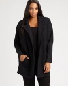 Whether worn over a sleek or relaxed-fit top, this boiled merino wool coat is sure to make a stylish first impression. Notched collarDolman sleevesWelt pocketsAbout 32 from shoulder to hemBody: merino woolSleeves: merino wool/nylon/spandexDry cleanImported