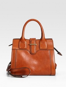 A structured shape with an optional shoulder strap for versatile style, crafted in ultra-luxe warm leather. Double top handles, 5 dropAdjustable, detachable shoulder strap, 19-23 dropTop-zip with flap closureOne inside zip pocketTwo inside open pocketsCotton lining11½W X 10H X 4DMade in Italy A structured shape with an optional shoulder strap for versatile style, crafted in ultra-luxe warm leather. Double top handles, 5 dropAdjustable, detachable shoulder strap, 19-23 dropTop-zip with flap closureOne inside zip pocketTwo inside open pocketsCotton lining11½W X 10H X 4DMade in Italy