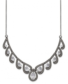 An alluring frontal necklace from Eliot Danori. Sparkling crystals and clear cubic zirconias (7-5/8 ct. t.w.) combine to present an enchanting appearance. Set in hematite tone brass. Approximate length: 16 inches + 2-inch extender. Approximate drop: 3/4 inches. An alluring frontal necklace from Eliot Danori. Sparkling crystals and clear cubic zirconias (7-5/8 ct. t.w.) combine to present an enchanting appearance. Set in hematite tone brass. Approximate length: 16 inches + 2-inch extender. Approximate drop: 3/4 inches.