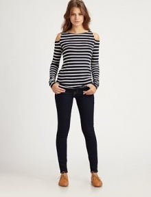 Cutout shoulders embolden this perennially chic striped top of super-soft jersey. RoundneckCutout shouldersLong sleevesLonger length hits below the hipsRayon/spandexDry cleanMade in USA of imported fabricModel shown is 5'10 (177cm) wearing US size Small.