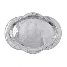 Shaped by hand of durable recycled aluminum, this striking platter from Mariposa is detailed with a softly textured finish and beaded edges for a look that's at once organic and refined. Shaped by hand of durable recycled aluminum, this striking platter from Mariposa is detailed with a softly textured finish and beaded edges for a look that's at once organic and refined.