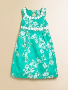 A vibrant, enchanting nature scene on wavy jacquard with lace detail and a keyhole back define this charming frock.ScoopneckSleevelessBack keyhole button and zipperPleated waistCottonMachine washImported A vibrant, enchanting nature scene on wavy jacquard with lace detail and a keyhole back define this charming frock.ScoopneckSleevelessBack keyhole button and zipperPleated waistCottonMachine washImported