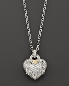 Pavé white sapphires glitter on this intricate heart pendant, strung on a gleaming sterling silver chain. A touch of 18Kgold detailing and a heart cutout at back add rich interest. Pavé white sapphires glitter on this intricate heart pendant, strung on a gleaming sterling silver chain. A touch of 18Kgold detailing and a heart cutout at back add rich interest.