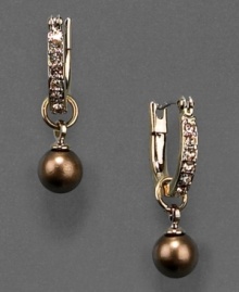 Scintillating style by Money. These beautiful drop earrings feature bronze glass pearls and crystal accents set in goldtone mixed metal. Approximate drop: 1/2 inch. Scintillating style by Money. These beautiful drop earrings feature bronze glass pearls and crystal accents set in goldtone mixed metal. Approximate drop: 1/2 inch.
