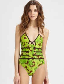 From its floral print and classic halter strap ties to its edgy cutout center and corset-inspired, waist-accentuating bodice, this design is simply irresistible.Halter strap ties at neckIntriguing cutout center detailTrim details create sexy corset effectBack clasp closure80% nylon/20% elastaneHand washMade in USA From its floral print and classic halter strap ties to its edgy cutout center and corset-inspired, waist-accentuating bodice, this design is simply irresistible.Halter strap ties at neckIntriguing cutout center detailTrim details create sexy corset effectBack clasp closure80% nylon/20% elastaneHand washMade in USA