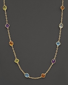 This multi gemstone necklace features colorful stone stations against a stunning 14 Kt. gold setting and chain.