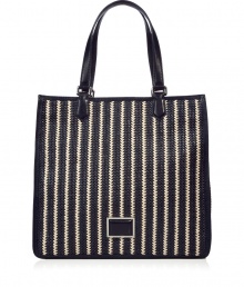 Stylish bag made ..of fine, navy blue and white striped synthetic fiber - Translucent straw-look is relaxed but sophisticated - Fashionable tote shape is spacious, trendy and deceptively roomy - Features two short, leather carrying handles - Perfect bag for everyday errands, business or study Stylish bag made ..of fine, navy blue and white striped synthetic fiber - Translucent straw-look is relaxed but sophisticated - Fashionable tote shape is spacious, trendy and deceptively roomy - Features two short, leather carrying handles - Perfect bag for everyday errands, business or study