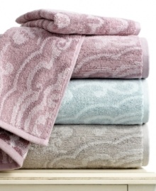 A tonal medallion design lends chic sophistication to the bath in this Lauren by Ralph Lauren Carlisle Medallion hand towel. Finished in pure cotton for a soft hand. Choose from three soft hues. A tonal medallion design lends chic sophistication to the bath in this Lauren by Ralph Lauren Carlisle Medallion hand towel. Finished in pure cotton for a soft hand. Choose from three soft hues.