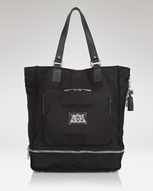 Day or night, get it right with this tote from Juicy Couture. It's all in the roomy silhouette and leather trims, which comes ready for anything in durable nylon. Day or night, get it right with this tote from Juicy Couture. It's all in the roomy silhouette and leather trims, which comes ready for anything in durable nylon.