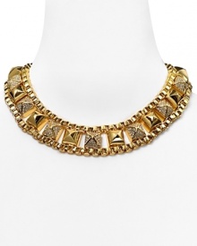 Juicy Couture crafts a cool-girl statement piece with this chunky chain link necklace, accented by a bold collar of pyramid studs. Juicy Couture crafts a cool-girl statement piece with this chunky chain link necklace, accented by a bold collar of pyramid studs.