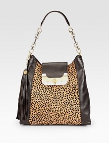 A beautiful leopard print hair calf panel with supple leather sides in a roomy carryall design.Leather and chain shoulder strap, 9 dropTurnlock strap closureDetachable tassel accentTwo outside open pockets, one under strap and one on backOne inside zip pocketTwo inside open pocketsOne pen holderFully lined13W X 12¾H X 4DImported A beautiful leopard print hair calf panel with supple leather sides in a roomy carryall design.Leather and chain shoulder strap, 9 dropTurnlock strap closureDetachable tassel accentTwo outside open pockets, one under strap and one on backOne inside zip pocketTwo inside open pocketsOne pen holderFully lined13W X 12¾H X 4DImported