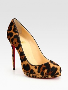 Leopard-print pony hair adds exoticism to this platform pump with leather trim and a signature red leather sole. Self-covered heel, 4½ (115mm)Covered platform, ½ (15mm)Compares to a 4 heel (100mm)Leopard-print pony hair upperLeather liningSignature red leather solePadded insoleMade in ItalyOUR FIT MODEL RECOMMENDS ordering one half size up as this style runs small. 