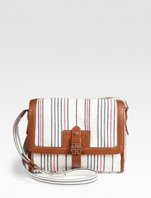 Bright vertical stripes adorn this soft nautical-inspired design, trimmed in ultra-rich contrasting leather. Adjustable shoulder strap, 17-20½ dropLeather flap top closureOne outside open pocketOne inside zip pocketTwo inside open pocketsLogo-printed canvas lining10¼W X 8½H X 3DImported Bright vertical stripes adorn this soft nautical-inspired design, trimmed in ultra-rich contrasting leather. Adjustable shoulder strap, 17-20½ dropLeather flap top closureOne outside open pocketOne inside zip pocketTwo inside open pocketsLogo-printed canvas lining10¼W X 8½H X 3DImported