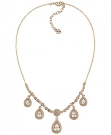 Lovely and luminous. Carolee's five teardrop frontal necklace features sparkling glass accents in 12k gold-plated mixed metal. Approximate length: 16 inches + 2-inch extender. Approximate drop: 1-1/4 inches. Lovely and luminous. Carolee's five teardrop frontal necklace features sparkling glass accents in 12k gold-plated mixed metal. Approximate length: 16 inches + 2-inch extender. Approximate drop: 1-1/4 inches.