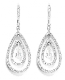 Who says bad things happen in threes? With a triple teardrop silhouette, Eliot Danori's earrings are fortunate and fashionable. Crafted in silver tone mixed metal, they're adorned with glittering cubic zirconias (1-1/2 ct. t.w.) and sparkling crystals. Approximate drop: 1-3/8 inches.