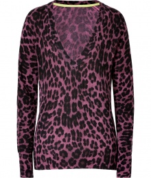 Work a wild edge into your knitwear wardrobe with Juicy Coutures tiger print wool-cashmere pullover - V-neckline, long sleeves, fine ribbed trim - Relaxed fit - Wear with favorite skinnies, mini-skirts or leggings Work a wild edge into your knitwear wardrobe with Juicy Coutures tiger print wool-cashmere pullover - V-neckline, long sleeves, fine ribbed trim - Relaxed fit - Wear with favorite skinnies, mini-skirts or leggings
