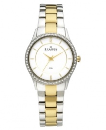 Accents matter. Gold tones and shimmering Swarovski elements create a stunning watch, by Skagen Denmark.