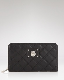 Marc Jacobs proves practical accessories can make a personal statement. A well-organized option for this well-dressed femme, this wallet makes stylish work of the day-to-day tasks. Marc Jacobs proves practical accessories can make a personal statement. A well-organized option for this well-dressed femme, this wallet makes stylish work of the day-to-day tasks.