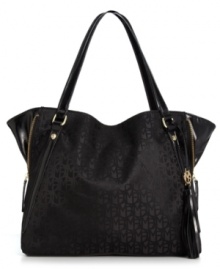 Add some signature style to any ensemble with this logo-print tote from Marc Fisher. Outfitted with the MF monogram and subtle golden hardware, this practical piece is the perfect addition to your accessories wardrobe. Add some signature style to any ensemble with this logo-print tote from Marc Fisher. Outfitted with the MF monogram and subtle golden hardware, this practical piece is the perfect addition to your accessories wardrobe.