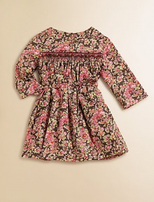 Blooming with brilliant flowers, this sweet cotton frock features a smocked bodice and and cinched waist with ribbon tie.Round necklineLong sleevesBack buttonsSmocked, gathered bodiceWaistband with ribbon tieFull, gathered skirtCottonMachine washImported Please note: Number of buttons may vary depending on size ordered. Blooming with brilliant flowers, this sweet cotton frock features a smocked bodice and and cinched waist with ribbon tie.Round necklineLong sleevesBack buttonsSmocked, gathered bodiceWaistband with ribbon tieFull, gathered skirtCottonMachine washImported Please note: Number of buttons may vary depending on size ordered.