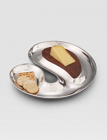 A dramatic interplay of swirling curves, handcrafted in lustrous alloy metal with a warm, acacia-wood inset that functions as a cheese board. Dense acacia wood will not absorb stains or odors Hand wash 16W X 1½H X 15¾D Imported A dramatic interplay of swirling curves, handcrafted in lustrous alloy metal with a warm, acacia-wood inset that functions as a cheese board. Dense acacia wood will not absorb stains or odors Hand wash 16W X 1½H X 15¾D Imported