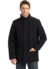 THE LOOKStand collar with concealed, zip-in hoodThroat tabZip front with snap storm flapDrawcord waistSlash pockets at chest; flap patch pockets at waistSnap cuffsVented back hemTHE FITAbout 28 from shoulder to hemTHE MATERIALShell: 50% polyester/43% cotton/7% nylonFill: polyesterFully linedCARE & ORIGINDry clean Imported THE LOOKStand collar with concealed, zip-in hoodThroat tabZip front with snap storm flapDrawcord waistSlash pockets at chest; flap patch pockets at waistSnap cuffsVented back hemTHE FITAbout 28 from shoulder to hemTHE MATERIALShell: 50% polyester/43% cotton/7% nylonFill: polyesterFully linedCARE & ORIGINDry clean Imported