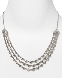 Give into glitz with this silver chain and crystal necklace from Carolee. Decked in dazzling crescent stations, it will add the perfect finish to any evening ensemble. Give into glitz with this silver chain and crystal necklace from Carolee. Decked in dazzling crescent stations, it will add the perfect finish to any evening ensemble.